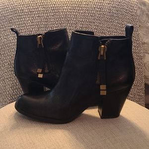 Black leather booties w/ zips